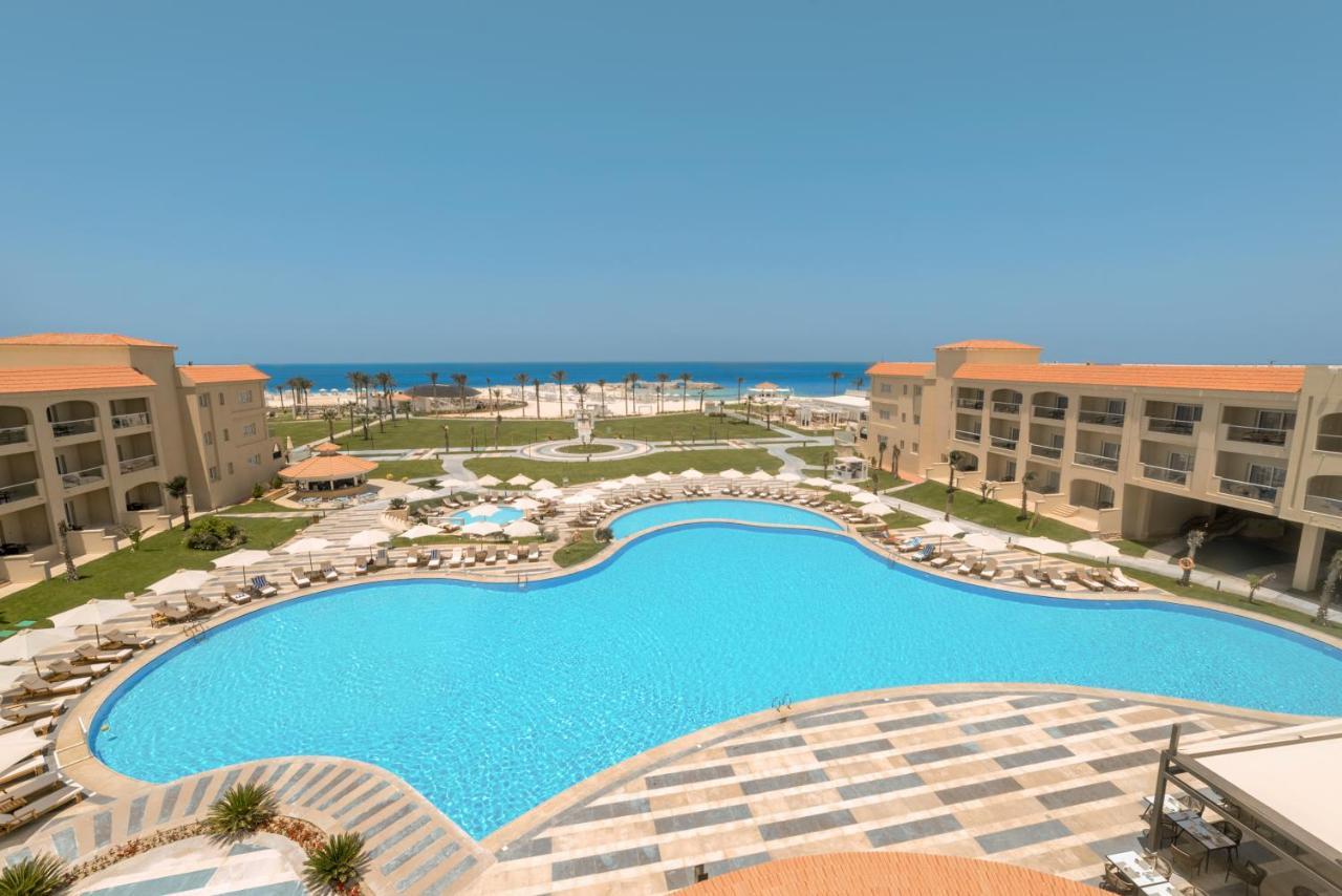 Rixos Alamein - Full Board Plus El Alamein Exteriér fotografie A pool at a resort in Egypt